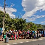 Venezuelan migrants receive food and medicine from the Red Cross near the Colombia-Venezuela border, February 2021. Schneyder Mendoza/AFP via Getty Images