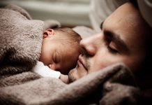 A father and child enjoy a moment of unconditional trust through the practice of freedom.