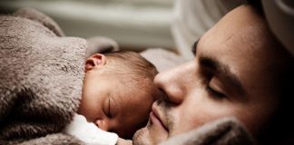 A father and child enjoy a moment of unconditional trust through the practice of freedom.