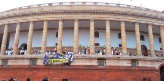 A protest unfolding outside the Parliament/ Photo Credit: The Tribune