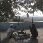 A devotee posing with the Dalit priest at the Chamunda Temple at Thana village, Bhilwara