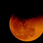The Earth’s atmosphere gives the Moon a blood-red glow during total lunar eclipses. Irvin Calicut/WikimediaCommons, CC BY-SA
