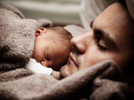 A father and child enjoy a moment of unconditional trust through the practice of freedom.